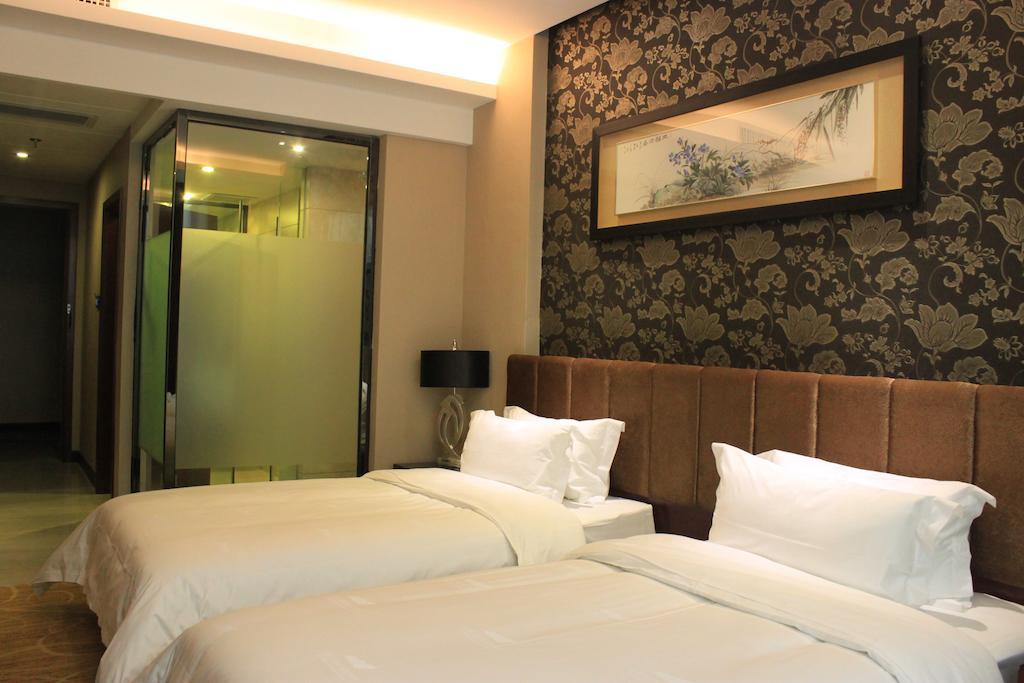 Sofis Tian Tian Holiday International Hotel Xiamen Rom bilde