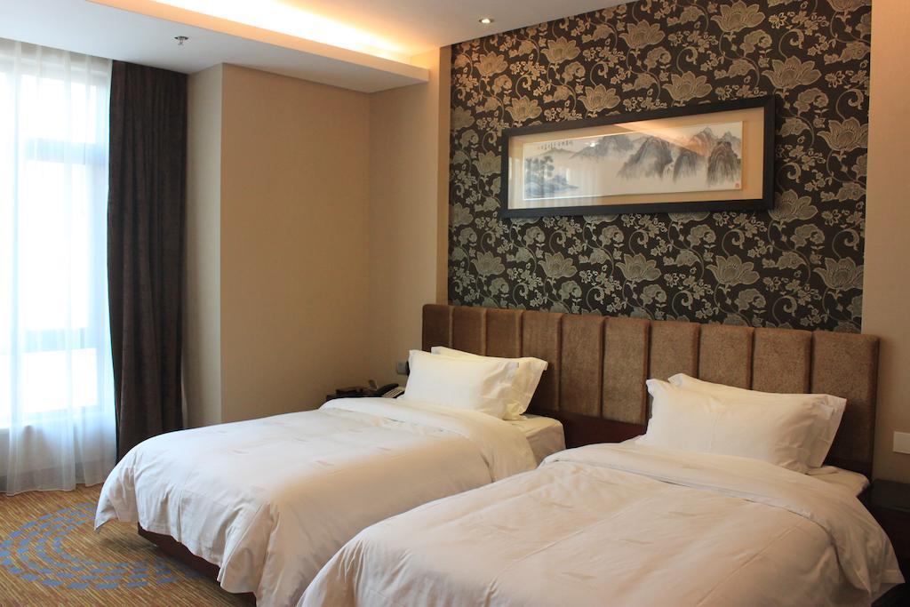 Sofis Tian Tian Holiday International Hotel Xiamen Rom bilde